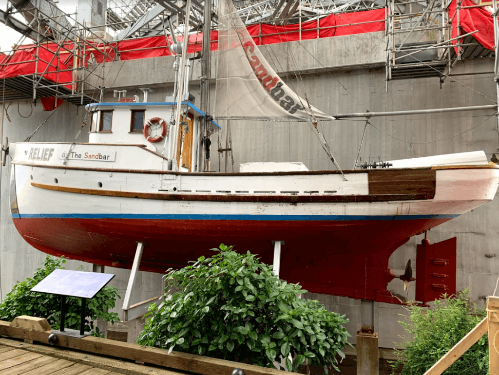 old fishing boat at the back of the restaurant 