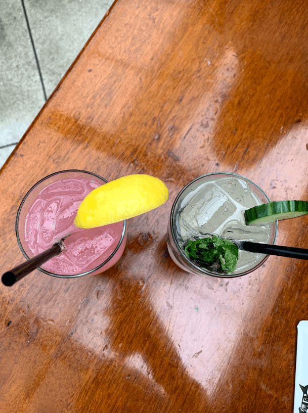 raspberry lemonade mocktail and a cucumber spritzer