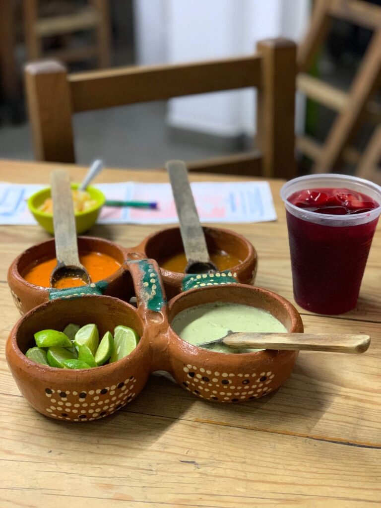 hibiscus drink and condiments Panchos Takos Mezcales