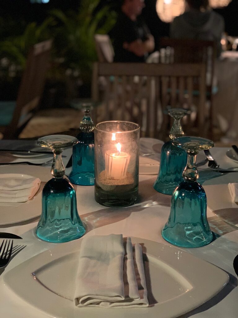 table setting with candle light Tuna Blanco Punta Mita